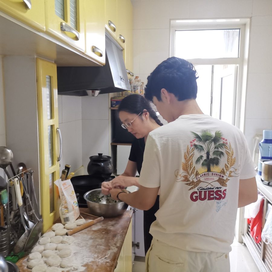 Making dumplings with extended family in Harbin