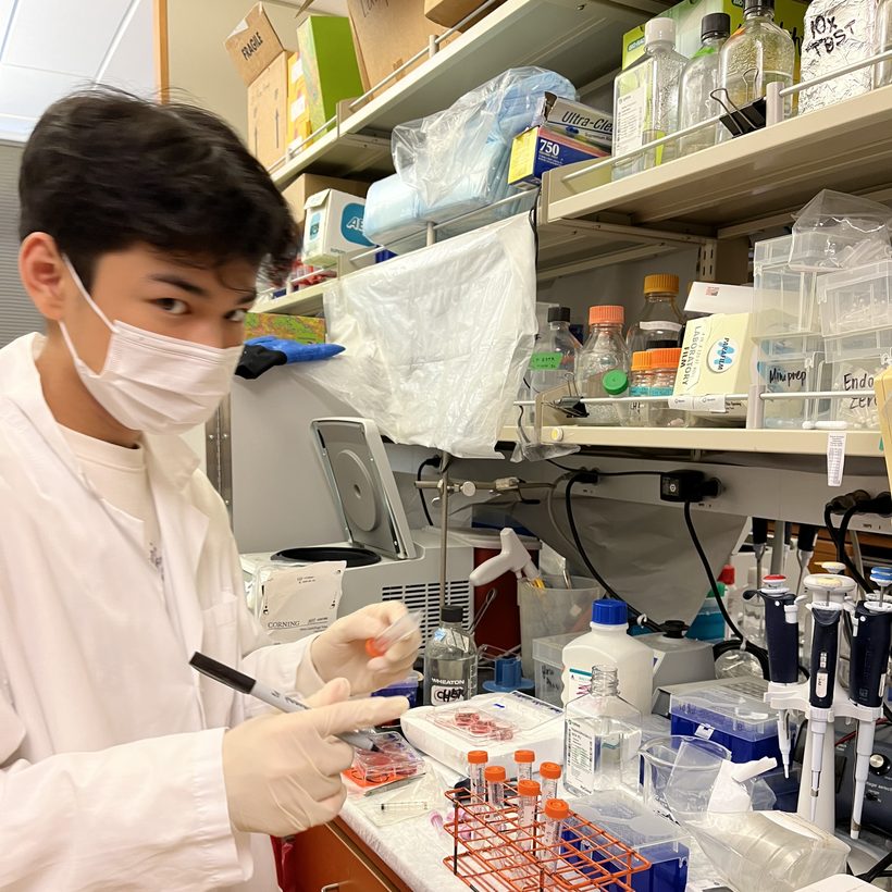 Ryan Li working at a lab bench